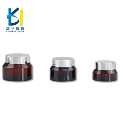 China New Design 15ml 30ml 50ml Slope Shoulder Recyclable Material Glass Cosmetic Jar With Silver Lid Glass Container for sale