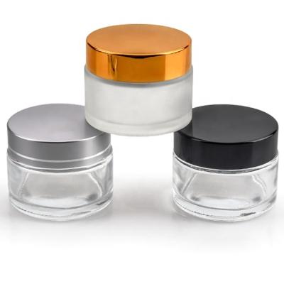 China Wholesale Luxury Empty Clear Glass Jar 50g Gold Double Material Recyclable Cosmetic Cream Screw Lid for sale