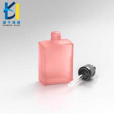 China Recyclable Perfume E Perfume Bottle 50ml Square Clear Matte Glass Bottle With Black Color Dropper for sale