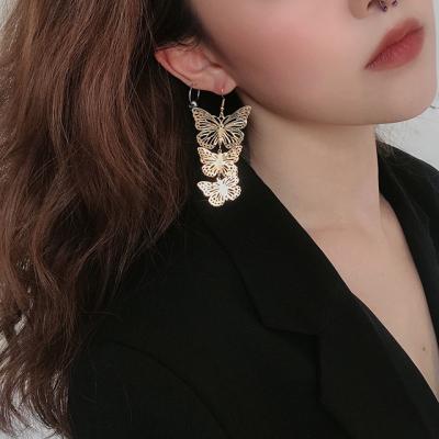 China TRENDY Style Hollow Fashion Long Butterfly Dangle Earrings For Women Jewelry Accessories for sale