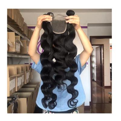 China Raw Unprocessed Virgin Brazilian Hair 30 Inch Bundles With 20 Inch 4x4 Lace Closure Sheer Body Wave Texture 100% Human Virgin Hair Wholesale for sale