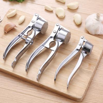 China Viable Alloy Garlic Press Grinder Multifunctional Kitchen Cooking Ginger Squeezer Masher Handheld Ginger Meat Grinder Tools for sale