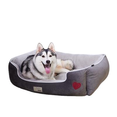 China Breathable Pet Cat Bed Washable Donut Cat and Dog PV Fur Round Pet Cushion Bed Heat Pet Beds for sale