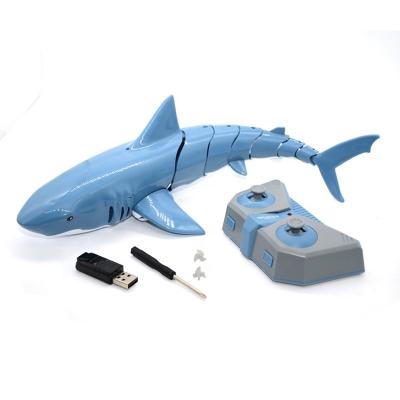 China Newest RC Hobby RC Boat Simulation Shark Remote Control Boat For Lakes Swim In The Water High Speed ​​2.4G 4 Channel RC Boats Kids for sale