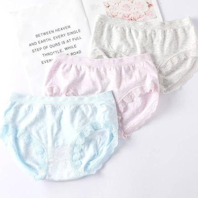 China Solid color anti-static sexy soft elastic ladies cotton waist underwear OEM lace seamless underwear for sale