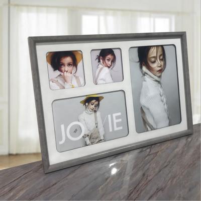 China 2021 New Cardboard Four Openings Creative Square Baby Picture Frame Wholesale Fashionable Simple Wall Hanging for sale