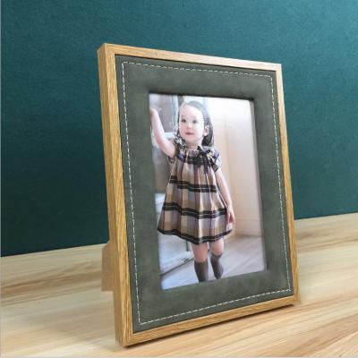 China Creative Fashionable High Quality Wood Leather Table Top Photo Frame for sale