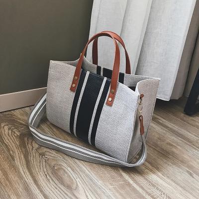 China Large handbags for women 2020 new trend korean women handbags fashion casual simple shoulder canvas tote bag leather to handle wild large handbags for women for sale