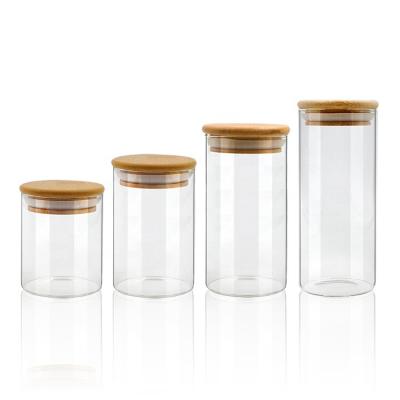 China 200ml 250ml 300ml 350ml Tube Shape Cylinder Kitchen Borosilicate Microwavable Sugar Glass Food Storage Jar With Bamboo Lid for sale