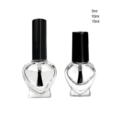 China Personal Care Supplier 5ml 10ml 15ml Unique Cute Clear Heart Shaped Unique Empty Nail Polish Glass Bottle With Brush Caps For Sale for sale