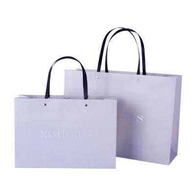 China Recyclable Custom White Black Unique Paper Bags Beige Kraft Paper Candy With Ribbon Green Paper Shopping Bag for sale