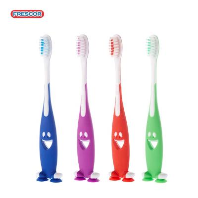 China Biodegradable Sucker Shark Cartoon Kids Junior Toothbrush With Soft 610 Bristle for sale