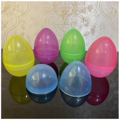 China Easter Maker Small Toy Candy Holder Basket Filler 8*12CM Colorful Dinosaur Egg Plastic Easter Eggs for sale