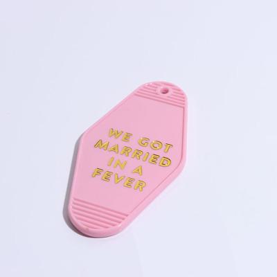 China Creative Hot Stamping Gift Custom Logo Hotel Acrylic Keychain Pink Hotel Key Chain for sale