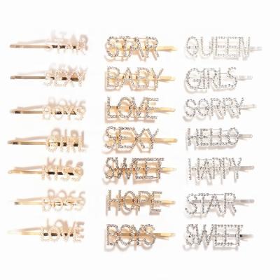 China Hot Material Fashion Friendly Material Fashion Gold Color Alphabet Hair Pins Bling Bling Rhinestone Letter Hair Clips For Girls for sale