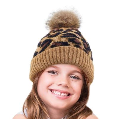 China COMMON High Quality Winter Knitted Warm Kids Hat Cute Beanie With Faux Fur Pom Hat for sale