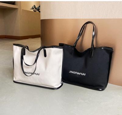 China New Fashion Canvas Bag Large Capacity Bag Women Handbag Printing Logo Fashion Shopping Bag for sale