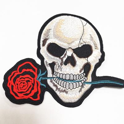 China Viable Wholesale Custom Iron On Clothes Embroidery Patches With Skull Logo for sale