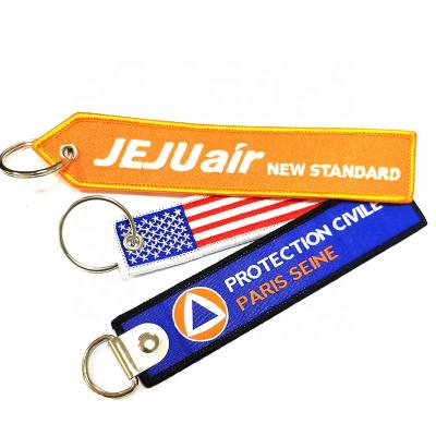 China Custom Embroidery Hot Selling Eco-friendly Key Chain Embroidered Key Indicator Spray Tag For Airplane/Motorcycle for sale