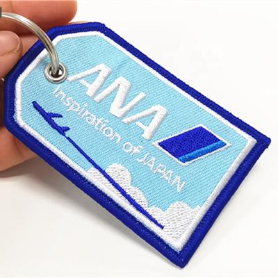 China Custom Embroidered Embroidered Designer Twill Fabric Key Chain Alphabet Logo Customized Key Chain Cheap Eco - Friendly for sale