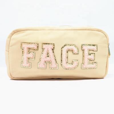 China Fashion Waterproof Nylon Fabric Toiletry Bag Personalized Cute Letter Makeup Cosmetic Bag for sale