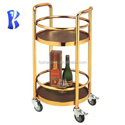 China Hotel Furniture OKEY Hospitality Equipment Supplies Round Commercial Luxury Golden Wooden Food Serving Cart Designs With Wheels for sale