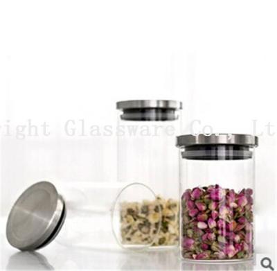 China Luxury design glass storage jar with metal lid for sale