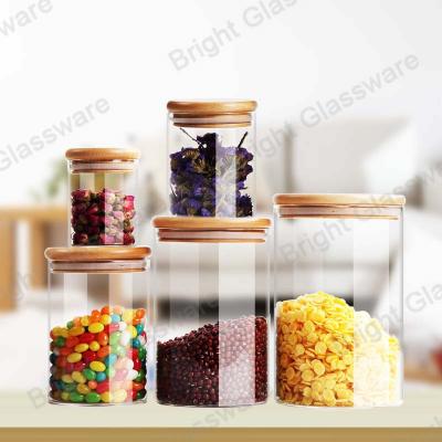 China Top Sale Clear Borosilicate Glass Candy Jars With Wooden Lid for sale