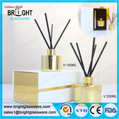 China high quality glass gold reed diffuser bottle with gift box for sale