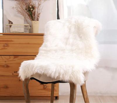 China Washable Luxury Soft Faux Sheepskin Chair Cover Cushion Pad Plush Fur Area Rugs For Bedroom for sale