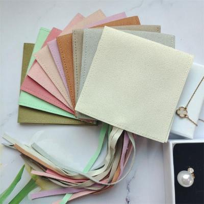 China Recyclable Custom Microfiber Jewelry Pouch Earrings Ring Necklace Gift Wedding Bag Ribbon Package Envelope Pouch for sale