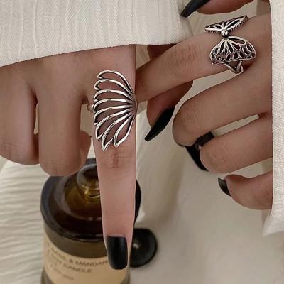 China Environmentally Friendly Hollow Angel Wings Ring Net Female Celebrity Fashion Design Niche Circle Smart Food Ring for sale