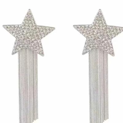 China Environmentally friendly exaggerated full diamond star tassel temperament five-pointed star net celebrity long earrings show face thin earrings for sale