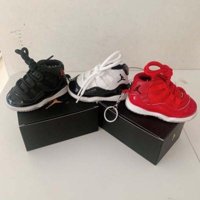 China Main Chained Shoe Charger Sneaker Power Bank Jordan Shoe Fast Charging Support Small Sneaker Portable Charger for sale