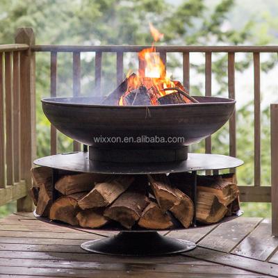 China Cast iron fire pit bowl with cooking storage / ledge and wooden ring of logs with BBQ ringstorage for sale