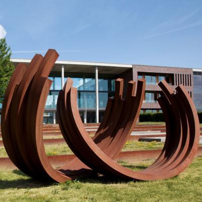 China Latest Design Durable Modern Abstract Landscape Decorative Custom Corten Steel Circles Sculpture for sale