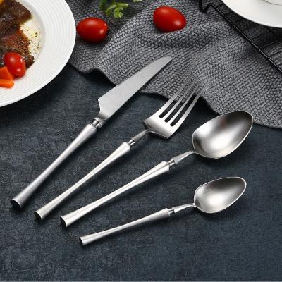 China Viable vintage silver 304 silver spoon fork knife stainless steel cutlery set flatware set cutleri 1810 flatware set for sale