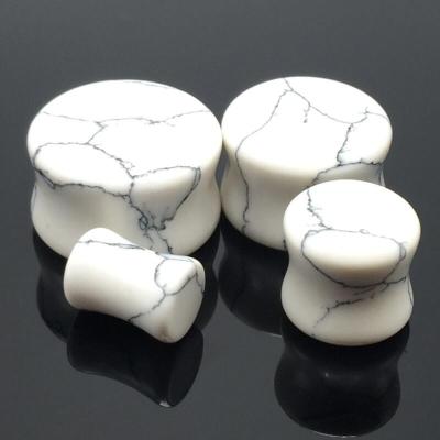 China Crystal Wholesale Cheap White Stone Saddle Flesh Tunnel Ear Gauges Ear Plugs for sale