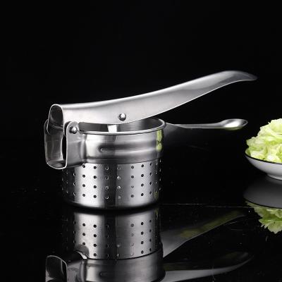 China Household Stainless Steel Manual Pressing Artifact Vegetable Filling Water Squeezing Device Multifunctional Potato Crusher Fruit Squeezer for sale