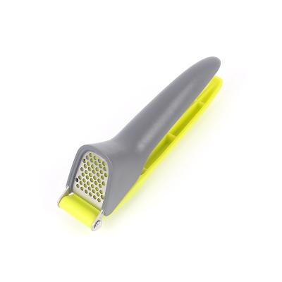 China Sustainable Factory Wholesale Household Vegetable Tools Stainless Steel Crusher Garlic Press for sale