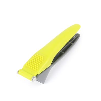 China High Quality Stainless Steel Kitchenware Fruit and Vegetable Tool Stainless Steel Bag Mordern Garlic Press Unique Design for sale