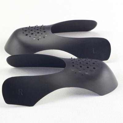 China Plastic Shoe Stretcher Keeping Sneakers Crinkle Anti-Wrinkle Bending Slot Toe Protector Shoe Support for sale