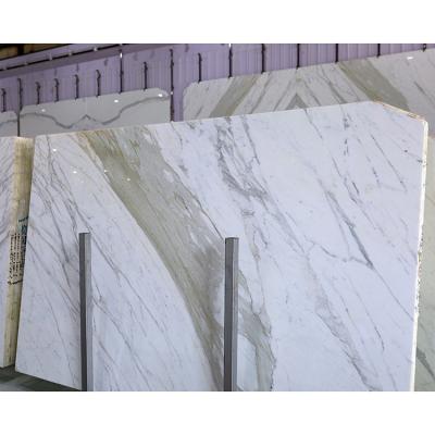 China Modern White Artificial Luxury Stair Tile Luxury Floor Panel Wall Decoration Calacatta Raw Marble Stone for sale