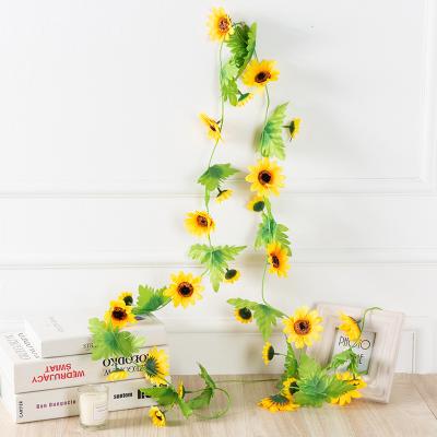 China Artificial Flower Vine Shop Window Display Fake Sunflower Silk Green Leaves Backdrop Rattan Flower Decor for sale