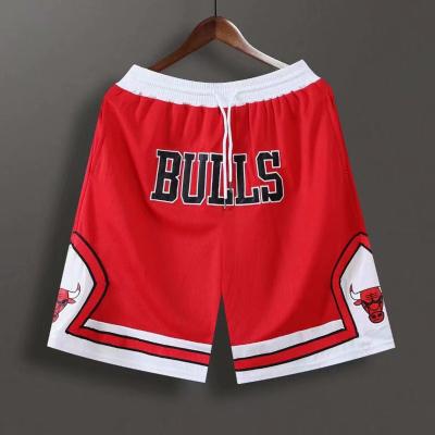 China 2021 High Quality Custom Antibacterial Mesh Zipper Pockets Bull Team Pants Basketball Running Shorts for sale