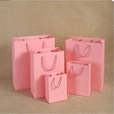 China Customized Design Recyclable Eco-Friendly Reusable Recycle Multifunctional Clothing Unique Gift Paper Bag Small Size for sale