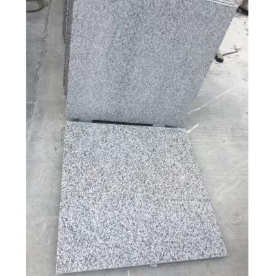 China Modern Factory Chinese Cheap White Flower Granite Tile Ivory Flooring On Sale for sale