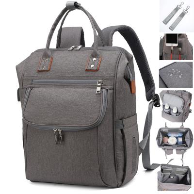 China Backpack Free Packing Customized Waterproof Dark Gray Baby Mummy Nappy Diaper Bag With Food Grade Pacifier Case for sale