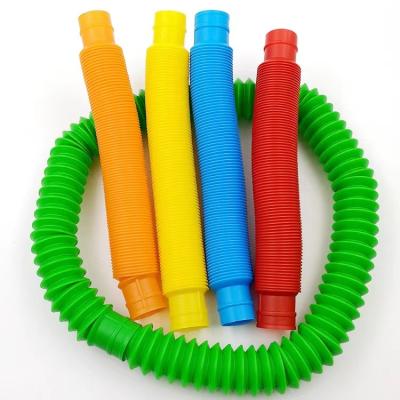 China Stress Relax Plastic Tube Wholesale Sensory Colorful Stretch Tube Decompression Most Popular Magic Noise Pipe Toy For Kids for sale