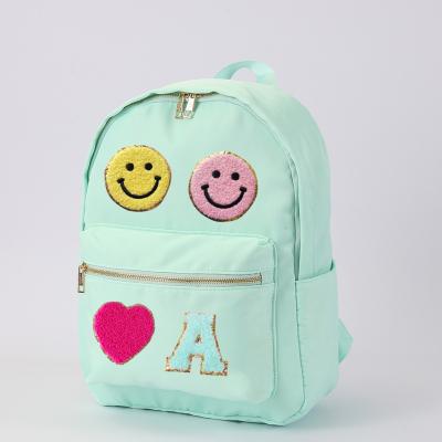 China Waterproof Current No MOQ New School Bag Travel Storage Bag Macaron Bright Candy Color Light Pink Nylon Backpack New for sale